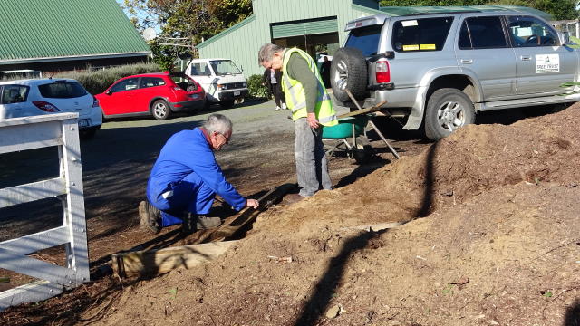 Bruce and John working on the edging 3.jpg